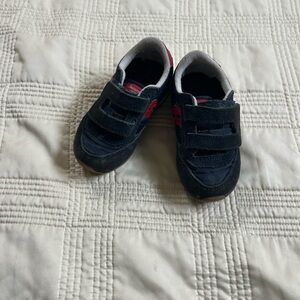 navy and red saucony kids